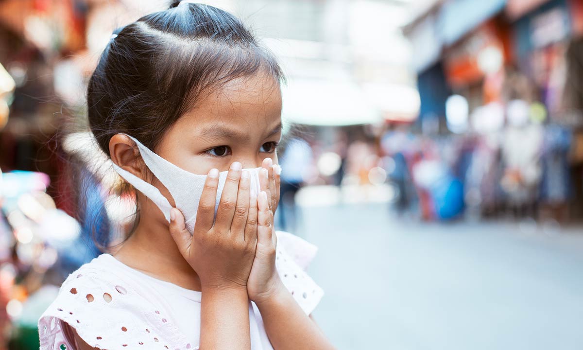 Girl with protective mask